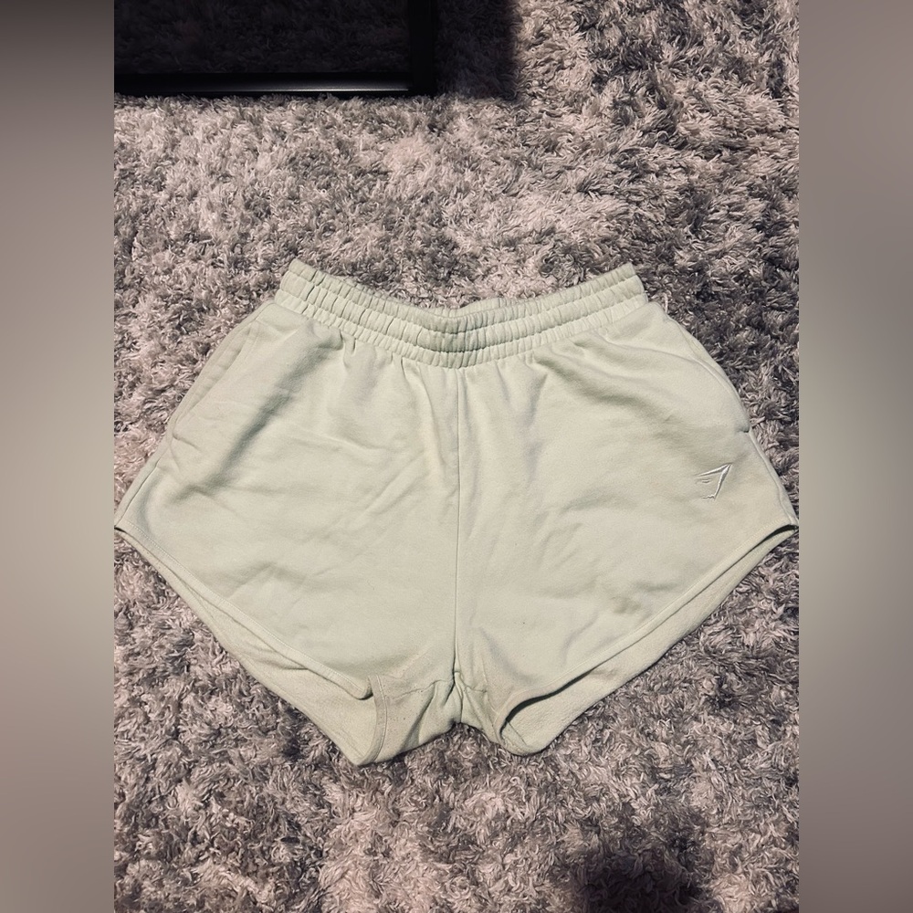 pale green/yellow gymshark sweat shorts
size L